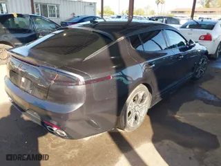 2020 Kia Stinger GT-Line with VIN KNAE15LA7L6074843, listed as a IAAI auction lot 41831509 with 86,410 mi miles. Bid and sale history available at carsss.com. Image 4.