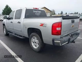 2011 Chevrolet Silverado 1500 LT with VIN 3GCPKSE30BG219790, listed as a IAAI auction lot 41163358 with 152,503 mi miles. Bid and sale history available at carsss.com. Image 3.