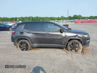 2018 Jeep Compass Latitude with VIN 3C4NJDBB0JT395844, listed as a IAAI auction lot 42405343 with 140,220 mi miles and . Bid and sale history available at DreamBid. Image 13.