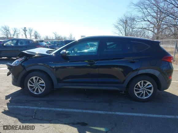 2016 Hyundai Tucson SE with VIN KM8J3CA41GU133962, listed as a IAAI auction lot 41634282 with 101,705 mi miles. Bid and sale history available at carsss.com. Image 14.