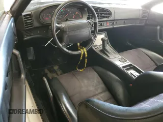 1992 Porsche 968 z VIN WP0CA2960NS840191, wystawiony jako Copart lot #75197694 z przebiegiem 122 386 mil mil oraz Szkody całkowita. Historia ofert i sprzedaży dostępna na DreamBid. Obrazek 8.