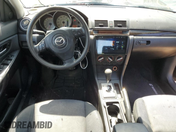 2007 Mazda 3 i Touring with VIN JM1BK12F771613103, listed as a Copart auction lot 52523994 with 259,387 mi miles and Salvage Title. Bid and sale history available at DreamBid. Image 8.