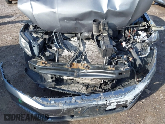 2016 Volkswagen Passat SE z VIN 1VWBT7A32GC016577, wystawiony jako IAAI lot #42334269 z przebiegiem 128 006 mil mil oraz . Historia ofert i sprzedaży dostępna na DreamBid. Obrazek 6.