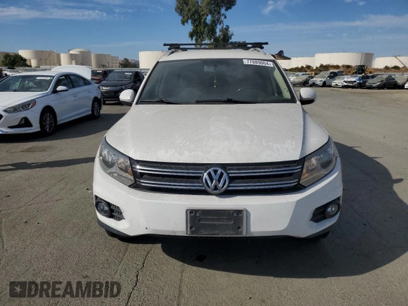 2012 Volkswagen Tiguan S with VIN WVGBV7AX3CW575463, listed as a Copart auction lot 77889064 with 168,520 mi miles and Salvage Title. Bid and sale history available at DreamBid. Image 5.
