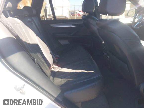2015 BMW X5 xDrive35i z VIN 5UXKR0C52F0P15584, wystawiony jako IAAI lot #41965143 z przebiegiem 94 118 mil mil oraz . Historia ofert i sprzedaży dostępna na DreamBid. Obrazek 8.