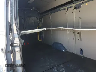 2020 Ford Transit Cargo with VIN 1FTBR3X8XLKA72246, listed as a Copart auction lot 57000035 with 65,458 mi miles and Salvage Title. Bid and sale history available at DreamBid. Image 11.