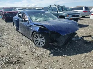 2017 Tesla Model S 100D z VIN 5YJSA1E27HF204491, wystawiony jako Copart lot #55160945 z przebiegiem 57 059 mil mil oraz Szkoda całkowita • Salvage title. Historia ofert i sprzedaży dostępna na DreamBid. Obrazek 14.