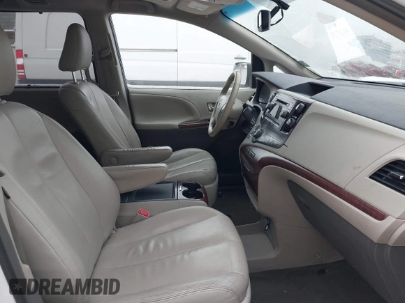 2014 Toyota Sienna XLE z VIN 5TDYK3DC6ES492167, wystawiony jako IAAI lot #41257193 z przebiegiem 216 046 mil mil oraz . Historia ofert i sprzedaży dostępna na DreamBid. Obrazek 5.