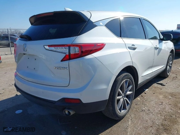 2020 Acura RDX w/Technology Pkg with VIN 5J8TC1H59LL011089, listed as a IAAI auction lot 41246036 with 66,261 mi miles. Bid and sale history available at carsss.com. Image 4.