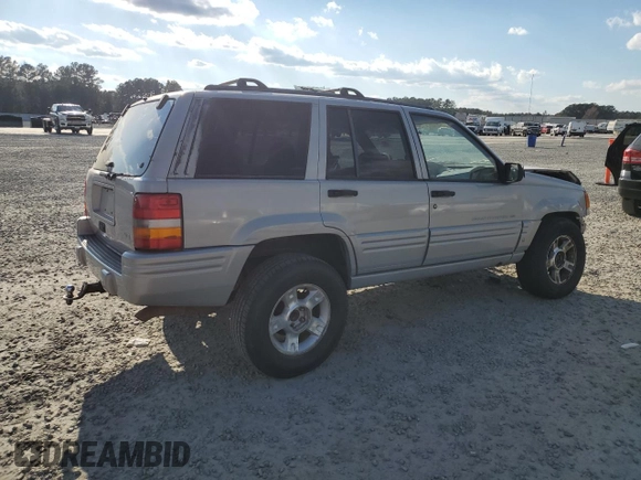 1998 Jeep Grand Cherokee with VIN 1J4GX48Y7WC216585, listed as a Copart auction lot 83532184 with 144,739 mi miles and Salvage title. Bid and sale history available at DreamBid. Image 3.