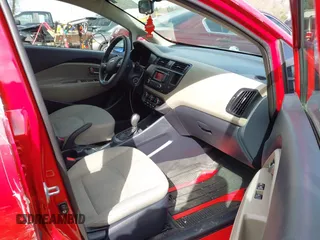 2014 Kia Rio LX with VIN KNADM4A31E6370963, listed as a IAAI auction lot 41720980 with 112,551 mi miles and . Bid and sale history available at DreamBid. Image 5.