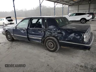 1995 Lincoln Town Car Signature z VIN 1LNLM82W0SY744473, wystawiony jako Copart lot #44752735 z przebiegiem Nie podano mil oraz Szkoda całkowita • Salvage title. Historia ofert i sprzedaży dostępna na DreamBid. Obrazek 2.