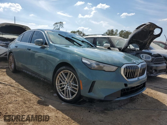 2024 BMW 5 Series 530i with VIN WBA43FJ0XRCP78759, listed as a Copart auction lot 76415134 with 0 mi miles and Salvage Title. Bid and sale history available at carsss.com. Image 4.