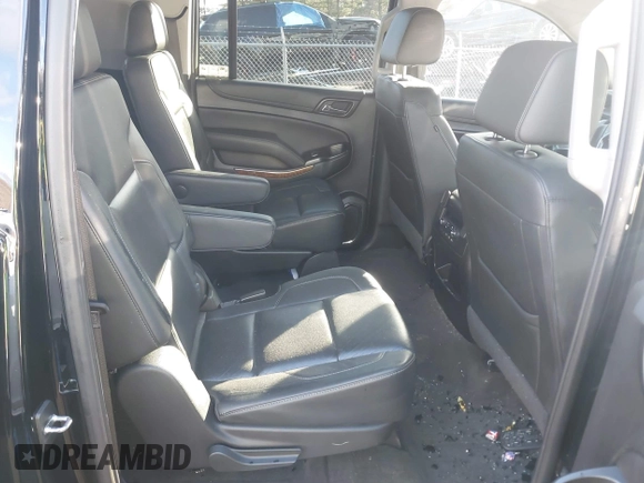 2019 Chevrolet Suburban Premier with VIN 1GNSKJKCXKR111502, listed as a IAAI auction lot 41075435 with 134,555 mi miles and . Bid and sale history available at DreamBid. Image 8.