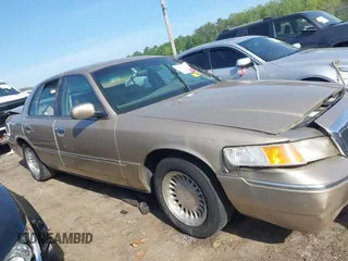 2000 Mercury Grand Marquis LS z VIN 2MEFM75W5YX627647, wystawiony jako IAAI lot #42072795 z przebiegiem 188 113 mil mil oraz . Historia ofert i sprzedaży dostępna na DreamBid. Obrazek 13.