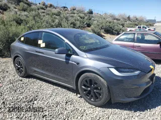 2023 Tesla Model X with VIN 7SAXCAE52PF380229, listed as a Copart auction lot 53535065 with 42,456 mi miles and Salvage Title. Bid and sale history available at DreamBid. Image 4.