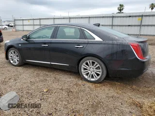 2019 Cadillac XTS Luxury z VIN 2G61M5S3XK9133339, wystawiony jako Copart lot #52651365 z przebiegiem 124 041 mil mil oraz Szkoda całkowita • Salvage title. Historia ofert i sprzedaży dostępna na DreamBid. Obrazek 2.