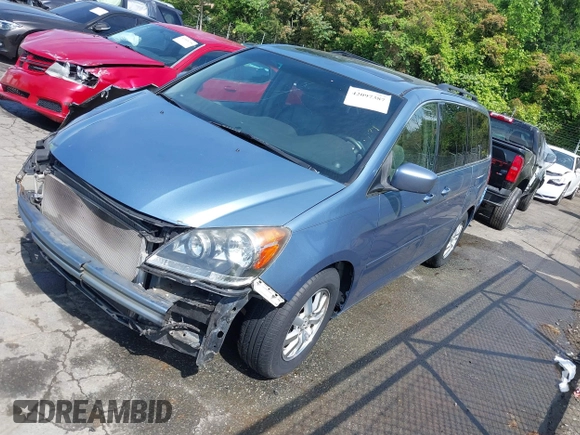 2008 Honda Odyssey EX-L with VIN 5FNRL38758B021134, listed as a IAAI auction lot 42097387 with 155,355 mi miles and . Bid and sale history available at DreamBid. Image 19.