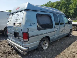2000 Ford Econoline Cargo Recreational with VIN 1FDRE14L5YHA56690, listed as a Copart auction lot 58926155 with 162,797 mi miles and Salvage title. Bid and sale history available at DreamBid. Image 3.