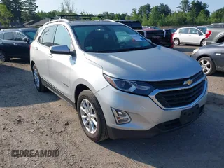 2018 Chevrolet Equinox LT z VIN 2GNAXSEV4J6118780, wystawiony jako IAAI lot #42284716 z przebiegiem 104 635 mil mil oraz . Historia ofert i sprzedaży dostępna na DreamBid. Obrazek 1.