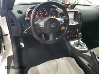 2013 Nissan 370Z Touring z VIN JN1AZ4EH5DM383466, wystawiony jako Copart lot #85704054 z przebiegiem 37 892 mil mil oraz Szkoda całkowita • Salvage title. Historia ofert i sprzedaży dostępna na DreamBid. Obrazek 8.