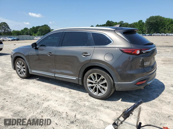 2018 Mazda CX-9 Grand Touring with VIN JM3TCADY1J0212568, listed as a Copart auction lot 60195385 with 151,099 mi miles and Salvage title. Bid and sale history available at DreamBid. Image 2.