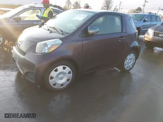 2013 Scion iQ with VIN JTNJJXB07DJ022337, listed as a IAAI auction lot 41507619 with 1 mi miles. Bid and sale history available at carsss.com. Image 2.