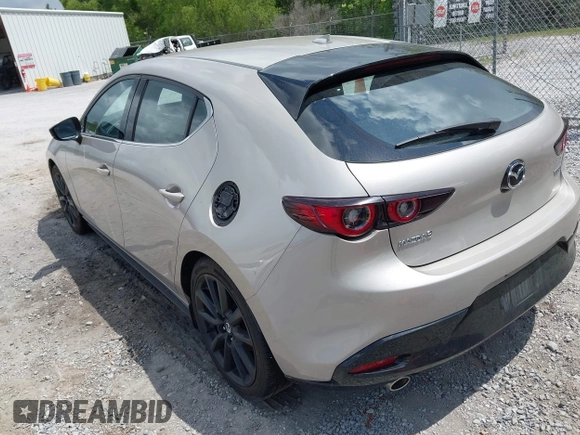 2022 Mazda Mazda3 Hatchback Premium with VIN JM1BPAML5N1507556, listed as a IAAI auction lot 42087802 with 56,507 mi miles. Bid and sale history available at carsss.com. Image 3.