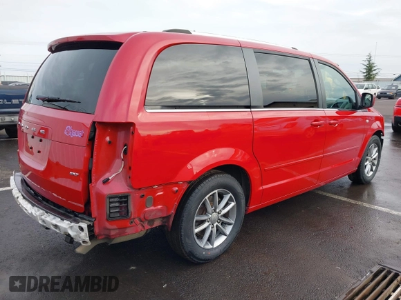 2014 Dodge Grand Caravan SXT with VIN 2C4RDGCG3ER257695, listed as a IAAI auction lot 41534568 with 116,896 mi miles and . Bid and sale history available at DreamBid. Image 4.