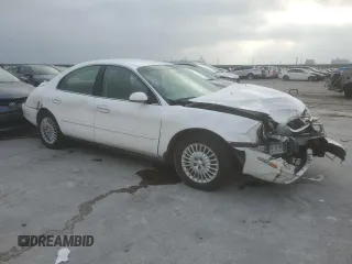 2003 Mercury Sable z VIN 1MEHM50U03G607064, wystawiony jako Copart lot #82373104 z przebiegiem 103 150 mil mil oraz Szkoda całkowita • Salvage title. Historia ofert i sprzedaży dostępna na DreamBid. Obrazek 4.