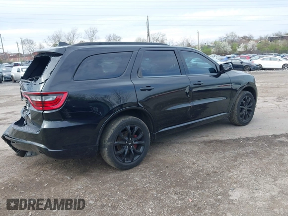 2019 Dodge Durango GT Plus with VIN 1C4RDJDG6KC561099, listed as a IAAI auction lot 41963187 with 104,153 mi miles and . Bid and sale history available at DreamBid. Image 4.