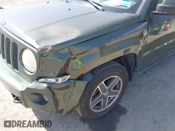 2008 Jeep Patriot Sport with VIN 1J8FF28W98D785130, listed as a IAAI auction lot 42069574 with 180,092 mi miles. Bid and sale history available at carsss.com. Image 6.