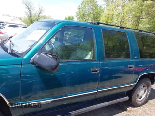 1997 GMC Suburban with VIN 3GKFK16R5VG508908, listed as a IAAI auction lot 42103068 with 264,446 mi miles and . Bid and sale history available at DreamBid. Image 15.