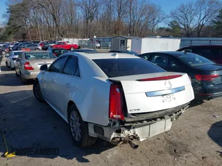 2011 Cadillac CTS Luxury z VIN 1G6DE5EY6B0118591, wystawiony jako IAAI lot #41486928 z przebiegiem 133 763 mil mil oraz . Historia ofert i sprzedaży dostępna na DreamBid. Obrazek 3.