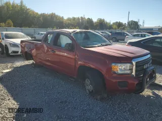 2015 GMC Canyon 2WD with VIN 1GTH5AE30F1182024, listed as a Copart auction lot 77032494 with 55,845 mi miles and Salvage Title. Bid and sale history available at carsss.com. Image 4.