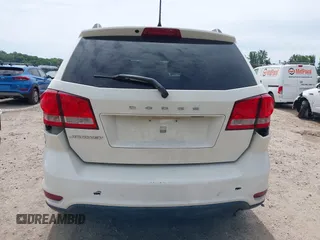2014 Dodge Journey SXT z VIN 3C4PDCBBXET135001, wystawiony jako IAAI lot #42318360 z przebiegiem 152 321 mil mil oraz . Historia ofert i sprzedaży dostępna na DreamBid. Obrazek 6.