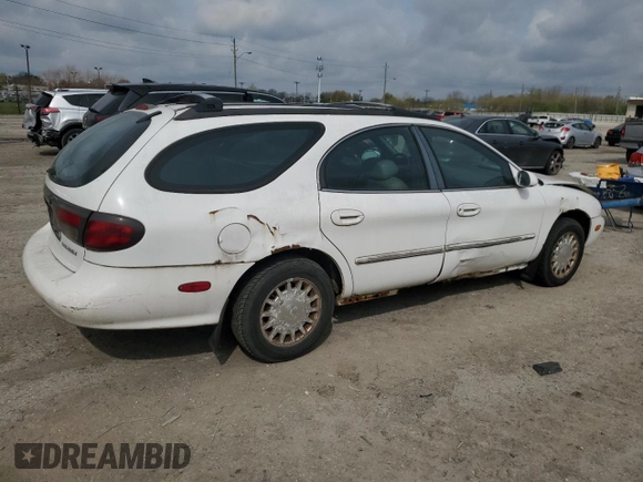 1999 Mercury Sable z VIN 1MEFM58U7XA652331, wystawiony jako Copart lot #49919194 z przebiegiem 143 835 mil mil oraz Szkoda całkowita • Salvage title. Historia ofert i sprzedaży dostępna na DreamBid. Obrazek 3.