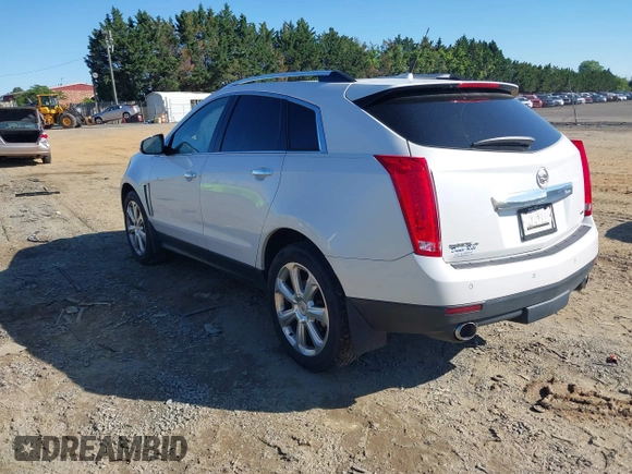 2013 Cadillac SRX Performance Collection with VIN 3GYFNHE31DS597987, listed as a IAAI auction lot 42319058 with 139,670 mi miles and . Bid and sale history available at DreamBid. Image 3.