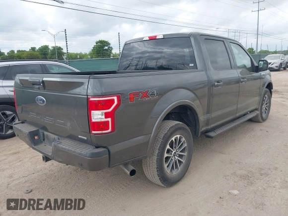 2020 Ford F-150 XL with VIN 1FTEW1E41LKE66857, listed as a IAAI auction lot 42041929 with 76,716 mi miles. Bid and sale history available at carsss.com. Image 4.