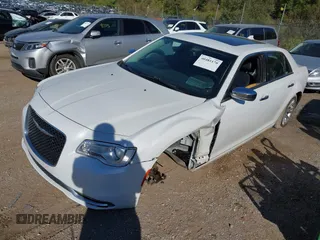 2016 Chrysler 300 with VIN 2C3CCAEG8GH198031, listed as a IAAI auction lot 40481170 with 118,874 mi miles. Bid and sale history available at carsss.com. Image 2.