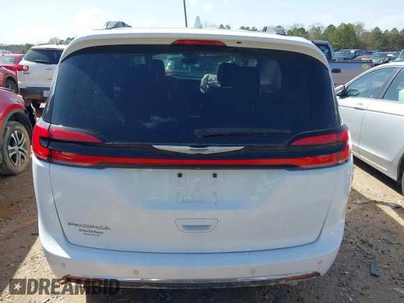 2022 Chrysler Pacifica Touring L with VIN 2C4RC1BGXNR132615, listed as a IAAI auction lot 41643983 with 45,717 mi miles and . Bid and sale history available at DreamBid. Image 16.