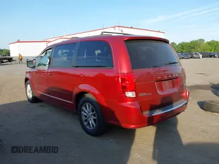 2014 Dodge Grand Caravan SXT z VIN 2C4RDGCG7ER479107, wystawiony jako IAAI lot #42155931 z przebiegiem 174 473 mil mil oraz . Historia ofert i sprzedaży dostępna na DreamBid. Obrazek 3.