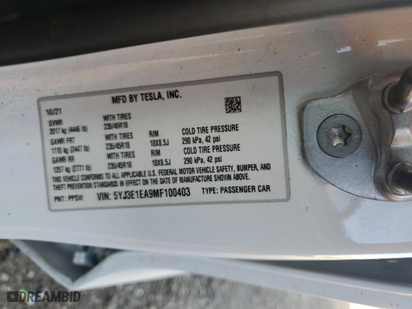2021 Tesla Model 3 Standard Range Plus with VIN 5YJ3E1EA9MF100403, listed as a Copart auction lot 48561545 with 68,996 mi miles and Salvage Title. Bid and sale history available at carsss.com. Image 12.
