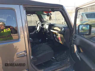 2017 Jeep Wrangler Unlimited Sahara with VIN 1C4BJWEG9HL507908, listed as a IAAI auction lot 41880209 with 99,773 mi miles. Bid and sale history available at carsss.com. Image 5.