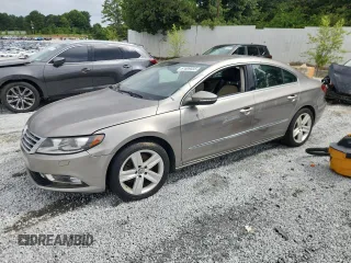 2014 Volkswagen CC Sport с VIN WVWBN7AN2EE509613, выставлен на аукционе Copart как лот 61609035 с пробегом 118 364 миль миль и Чистый • Clean title. История ставок и продаж доступна на DreamBid. Изображение 1.