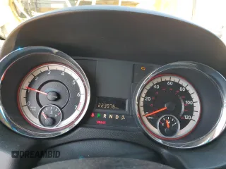 2012 Dodge Grand Caravan SE with VIN 2C4RDGBG1CR402909, listed as a Copart auction lot 51176555 with 223,976 mi miles and Salvage Title. Bid and sale history available at DreamBid. Image 9.