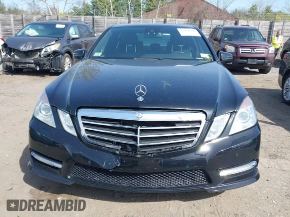 2012 Mercedes-Benz E E 350 Luxury with VIN WDDHF8JB1CA613068, listed as a IAAI auction lot 42119706 with 197,476 mi miles. Bid and sale history available at carsss.com. Image 12.