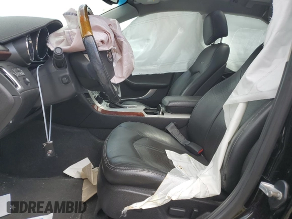 2014 Cadillac CTS with VIN 1G6DH8E3XE0134312, listed as a Copart auction lot 61556874 with 77,194 mi miles and Salvage Title. Bid and sale history available at DreamBid. Image 7.
