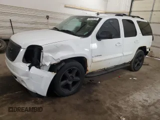 2007 GMC Yukon SLT z VIN 1GKFK130X7J303298, wystawiony jako Copart lot #53379735 z przebiegiem 288 293 mil mil oraz Szkoda całkowita • Salvage title. Historia ofert i sprzedaży dostępna na DreamBid. Obrazek 1.