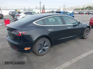 2020 Tesla Model 3 Long Range z VIN 5YJ3E1EB0LF600098, wystawiony jako IAAI lot #41071258 z przebiegiem 149 939 mil mil oraz . Historia ofert i sprzedaży dostępna na DreamBid. Obrazek 4.